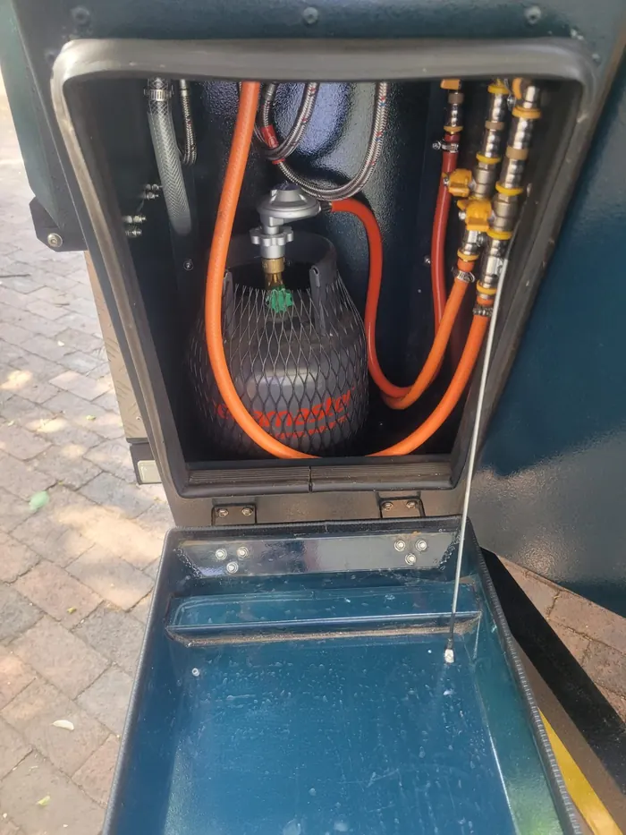 Hyena S1 gas bottle compartment with regulator and hoses